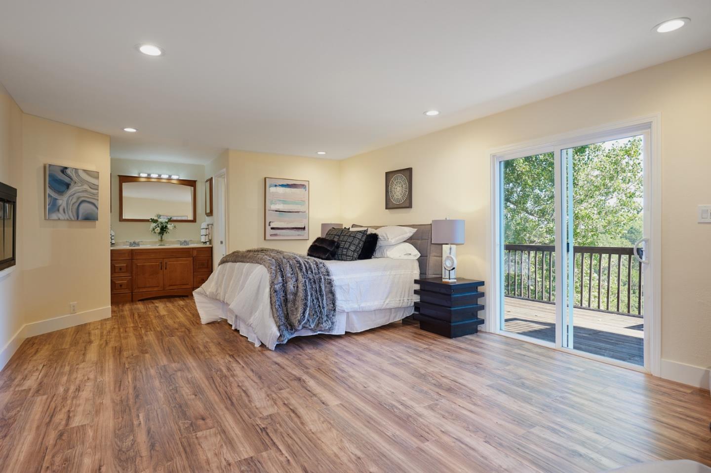 1132 Lassen Drive Belmont, CA 94002 - Photo 14 of 27 a living room with furniture and a large window