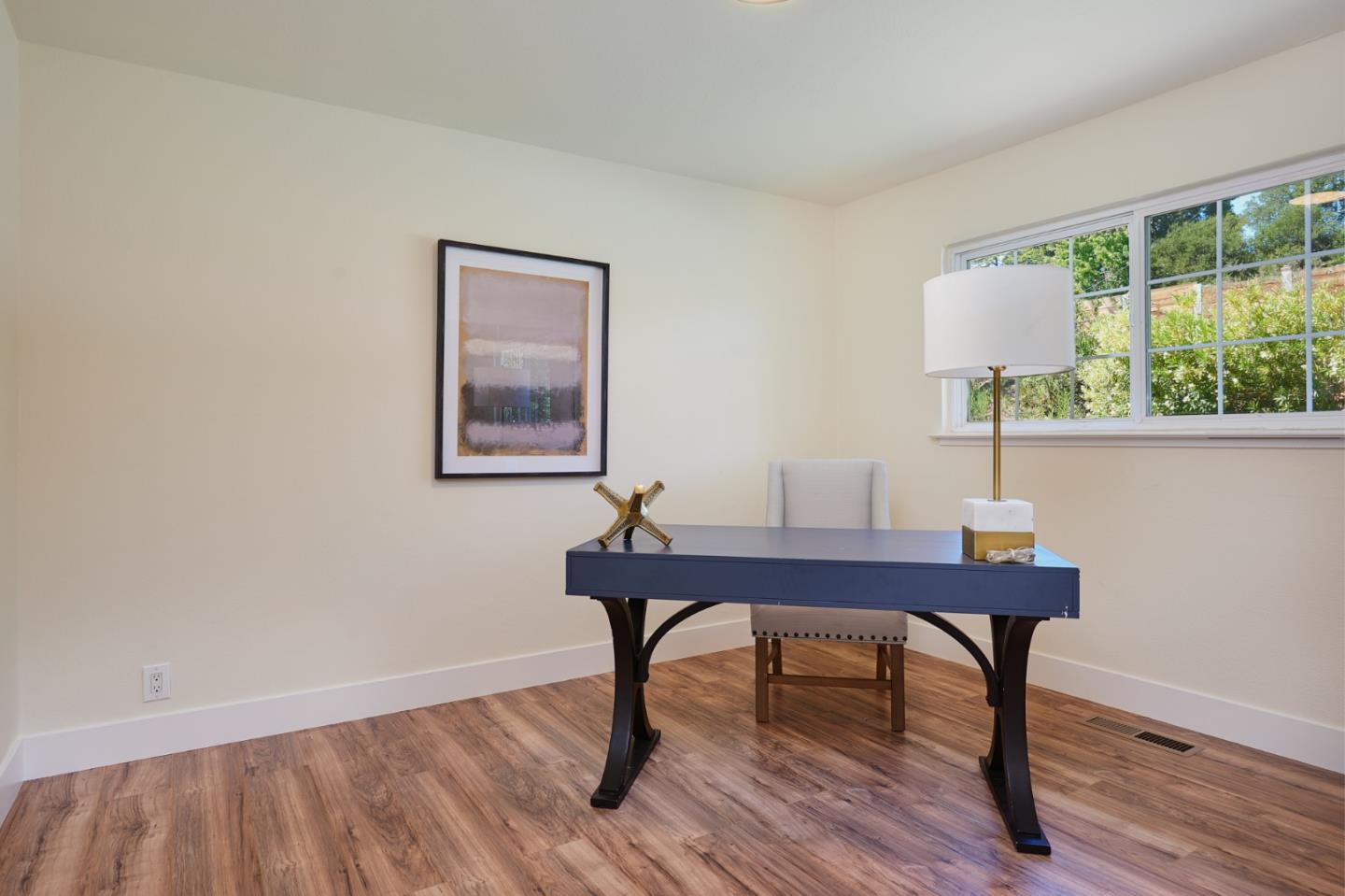 1132 Lassen Drive Belmont, CA 94002 - Photo 19 of 27 a view of a workspace with furniture and window