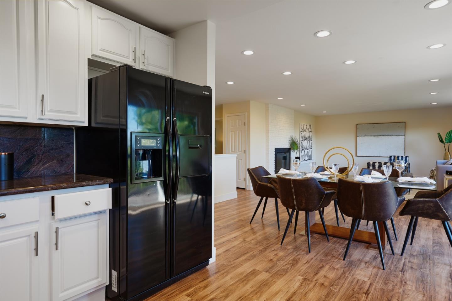 1132 Lassen Drive Belmont, CA 94002 - Photo 9 of 27 a view of a dining room with furniture and wooden floor