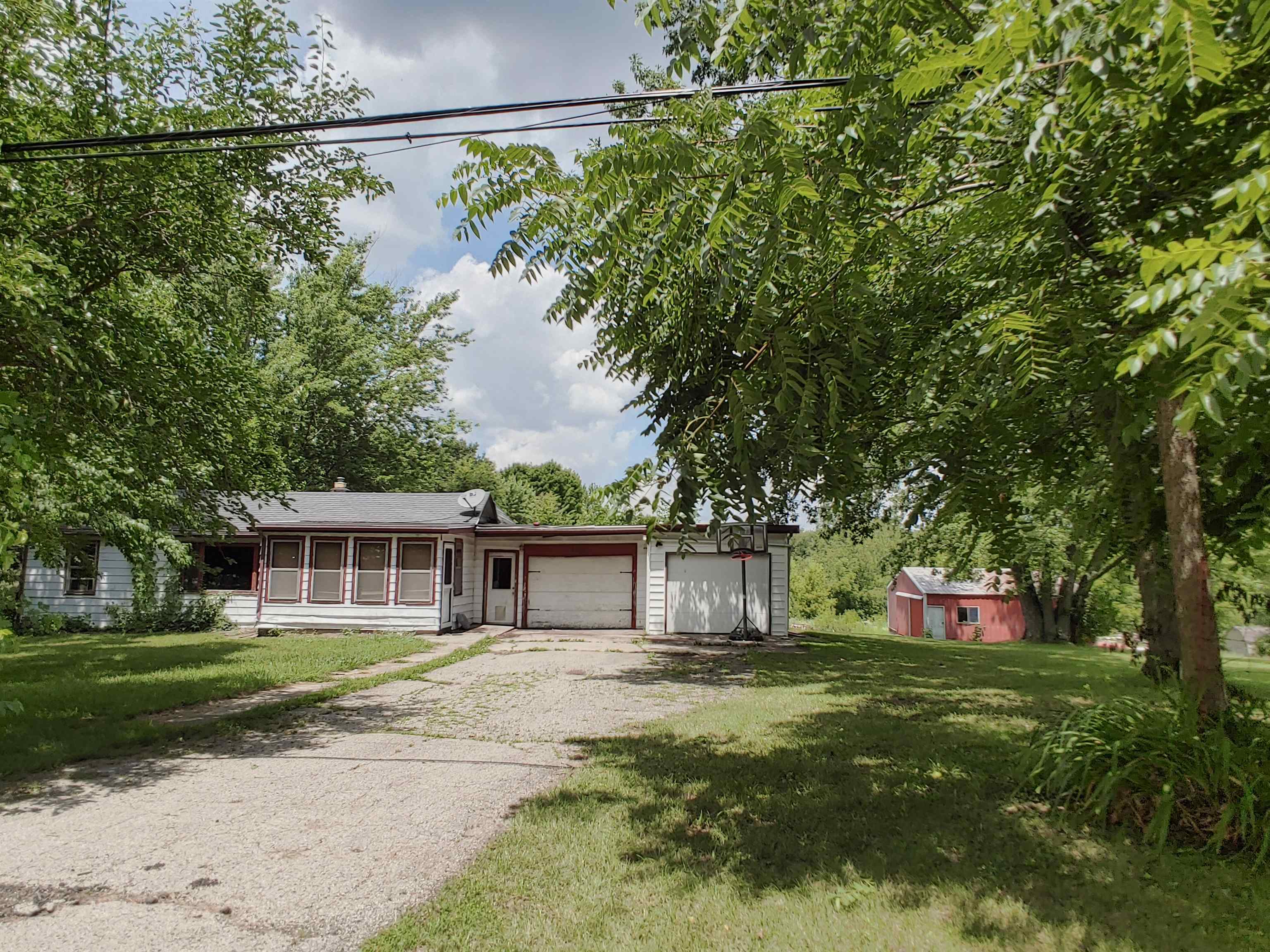 a house view with a garden space