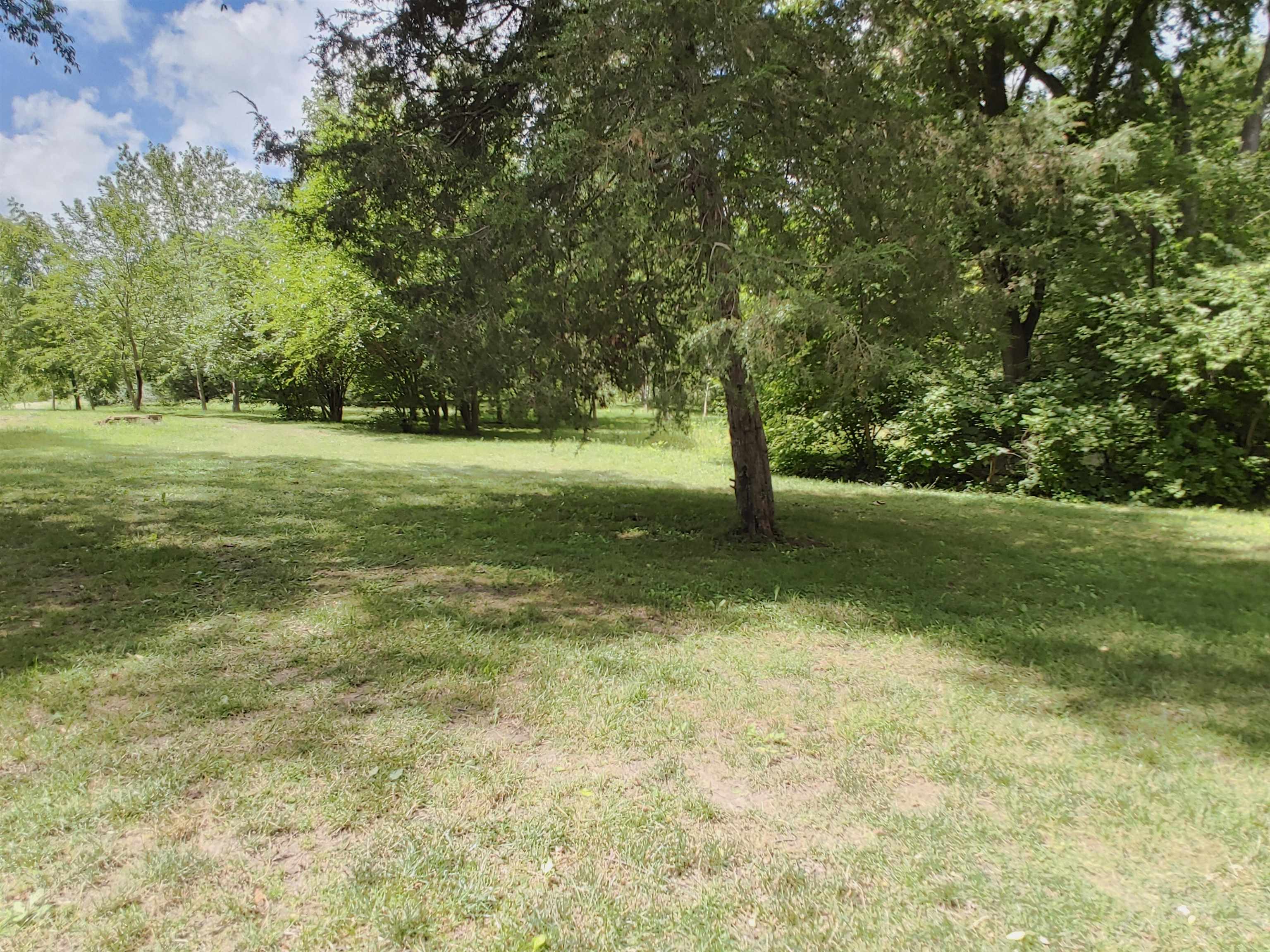 5152 Blackhawk Road Rockford, IL 61109 - Photo 14 of 31 a view of field with trees