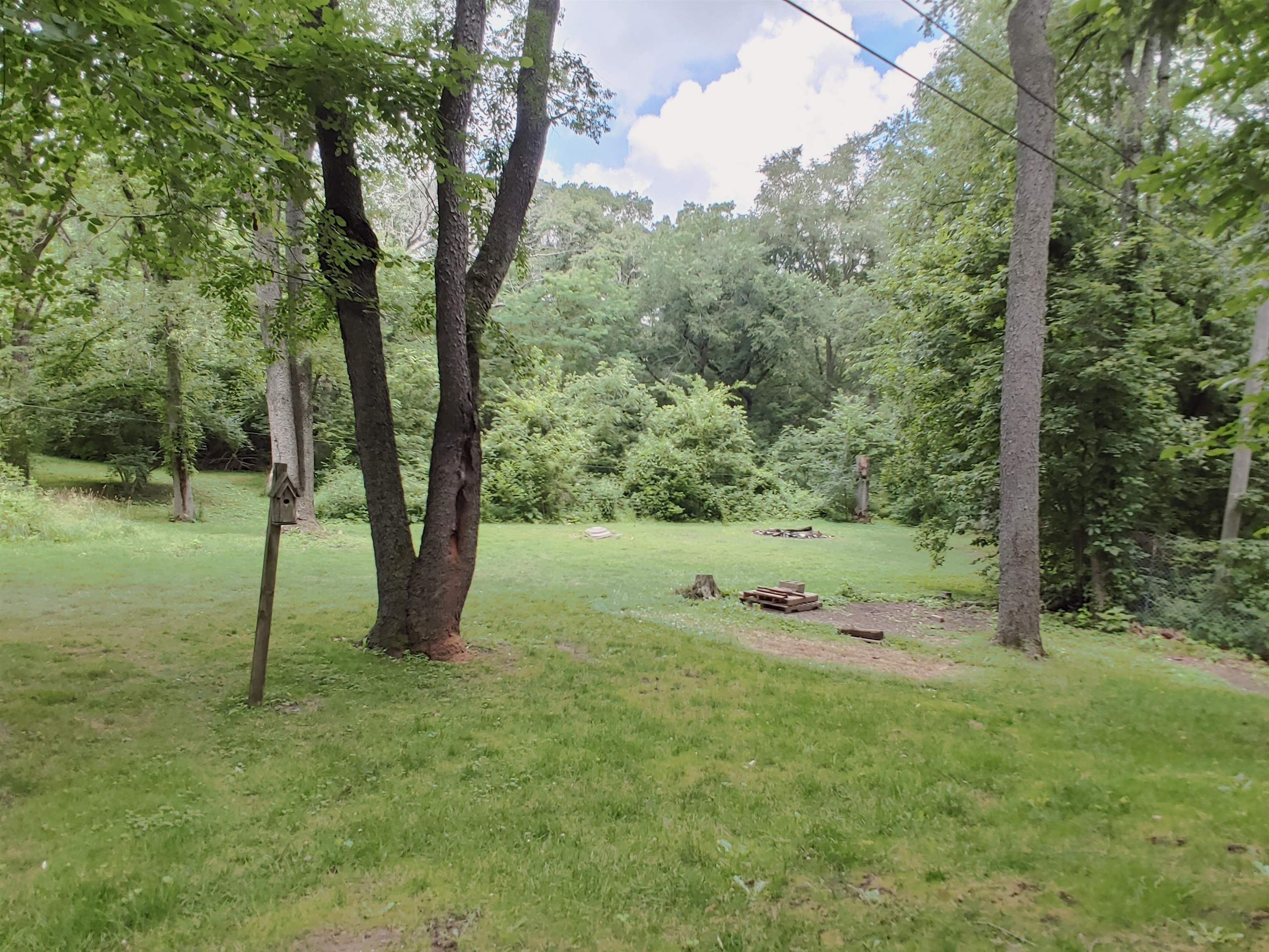 5152 Blackhawk Road Rockford, IL 61109 - Photo 21 of 31 a view of a tree in a yard