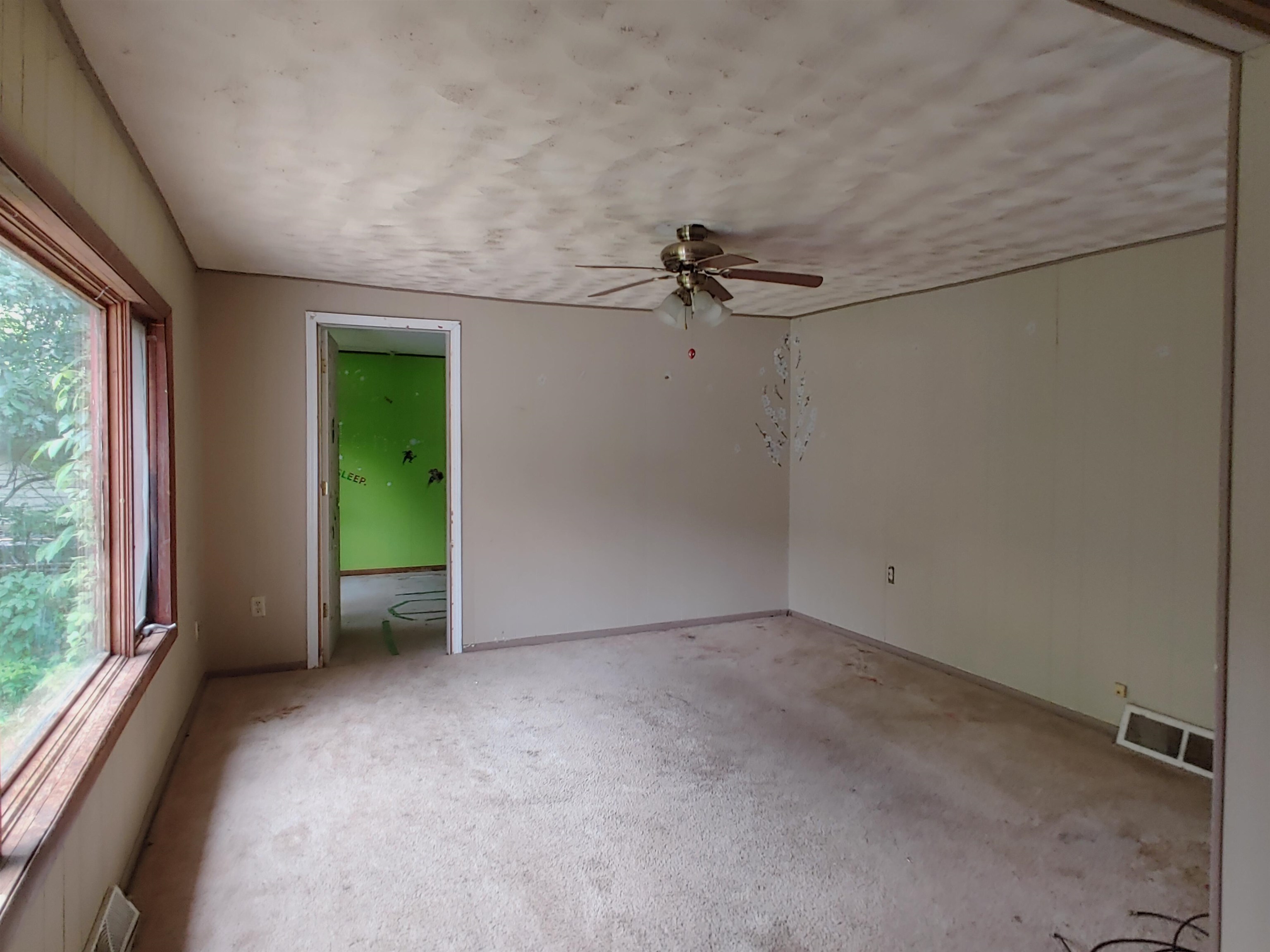 5152 Blackhawk Road Rockford, IL 61109 - Photo 26 of 31 a view of a room with a flat tv screen and windows