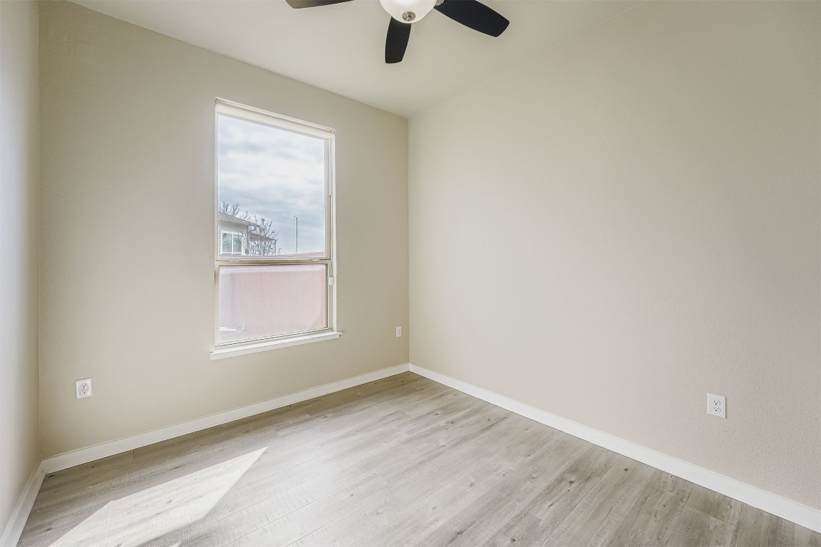 11209 American Mustang Loop Manor, TX 78653 - Photo 11 of 34 an empty room with a window