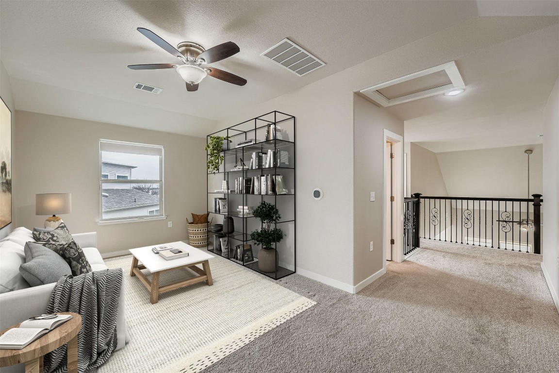 11209 American Mustang Loop Manor, TX 78653 - Photo 26 of 34 a living room with furniture