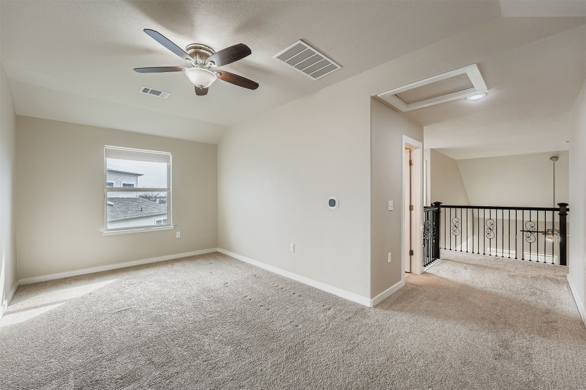 11209 American Mustang Loop Manor, TX 78653 - Photo 28 of 34 a view of an empty room with a window