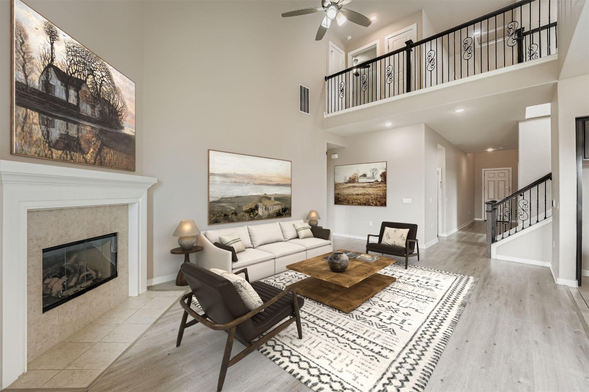 11209 American Mustang Loop Manor, TX 78653 - Photo 7 of 34 a living room with furniture and a fireplace