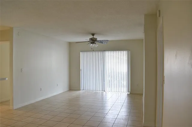 a front view of a house with tree s
