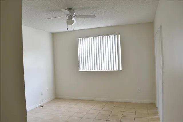 a view of walk in closet with cabinet