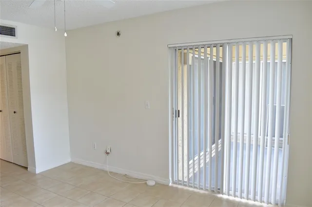 a bathroom with a bathtub and toilet