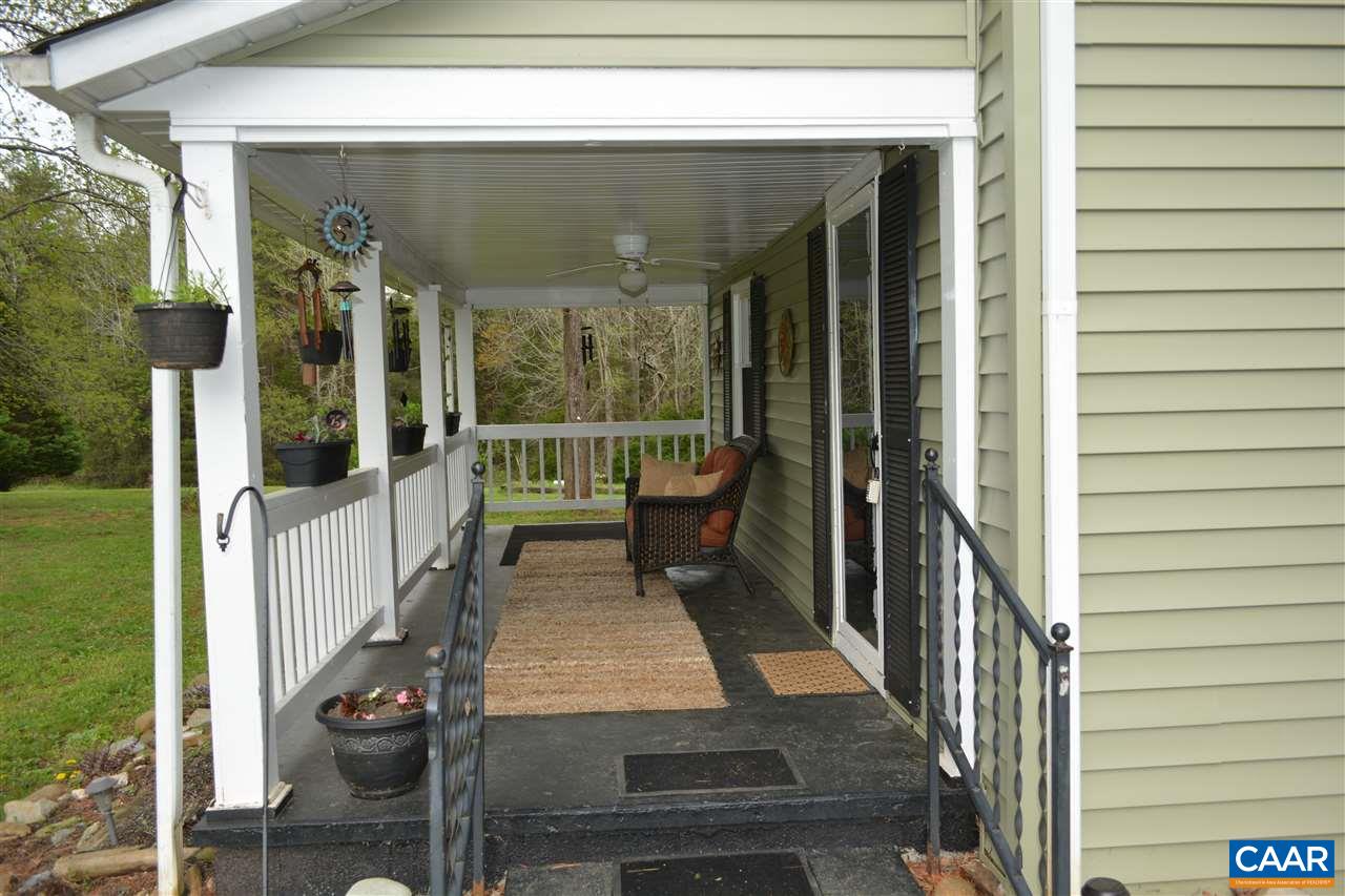 2720 Cedar Lane Road Kents Store, VA 23084 - Photo 4 of 27 a view of balcony and porch with furniture
