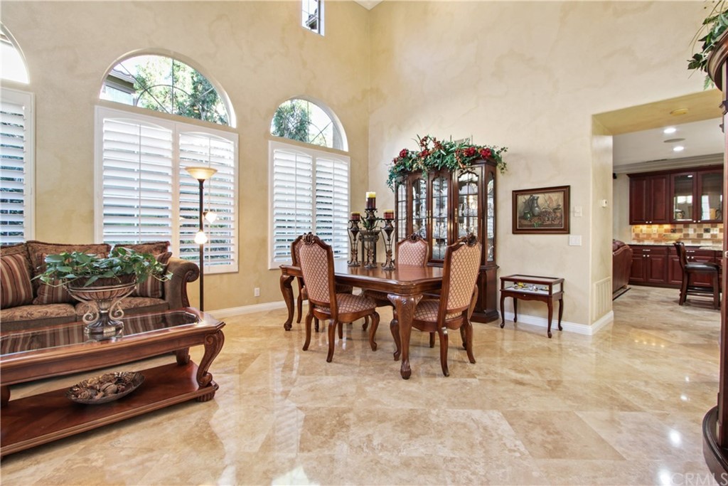 11610 Goetting Avenue Tustin, CA 92782 - Photo 12 of 62 a living room with furniture and a large window