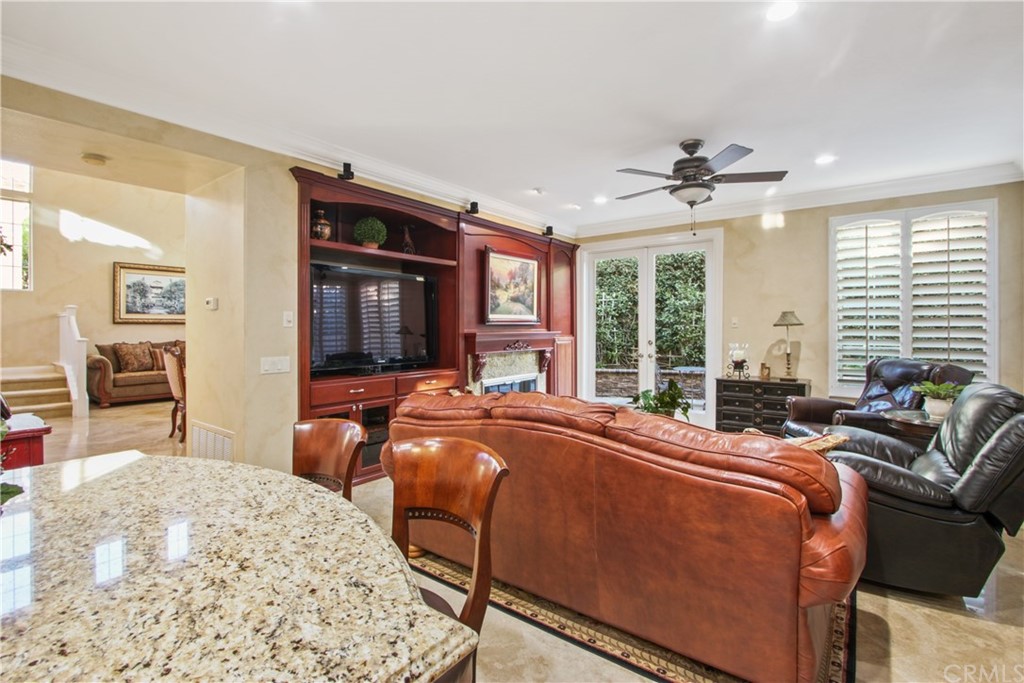 11610 Goetting Avenue Tustin, CA 92782 - Photo 13 of 62 a bed room with a bed and a couch