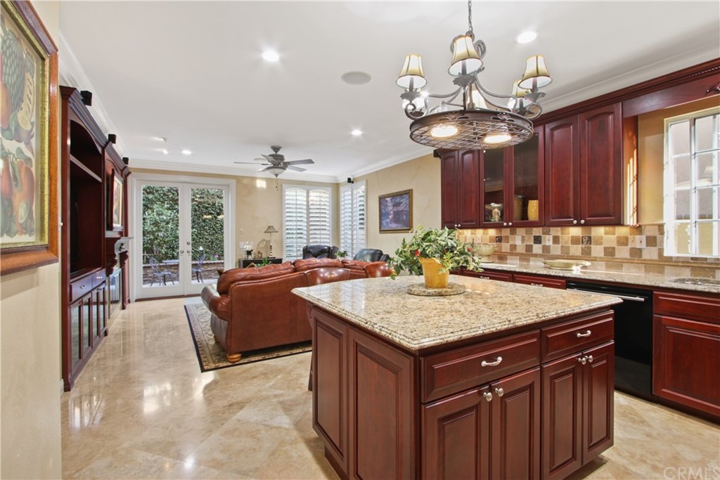 11610 Goetting Avenue Tustin, CA 92782 - Photo 14 of 62 a kitchen with a counter space a sink appliances and cabinets