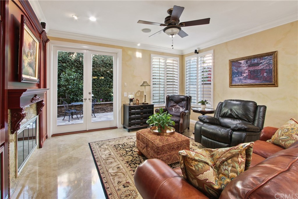 11610 Goetting Avenue Tustin, CA 92782 - Photo 15 of 62 a living room with furniture and a large window