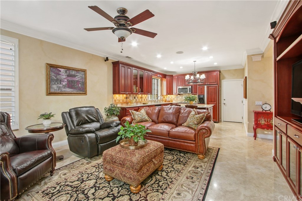 11610 Goetting Avenue Tustin, CA 92782 - Photo 17 of 62 a living room with furniture ceiling fan and a rug