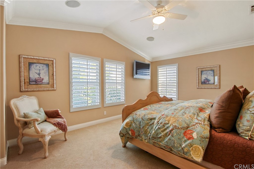 11610 Goetting Avenue Tustin, CA 92782 - Photo 26 of 62 a bedroom with a bed and furniture