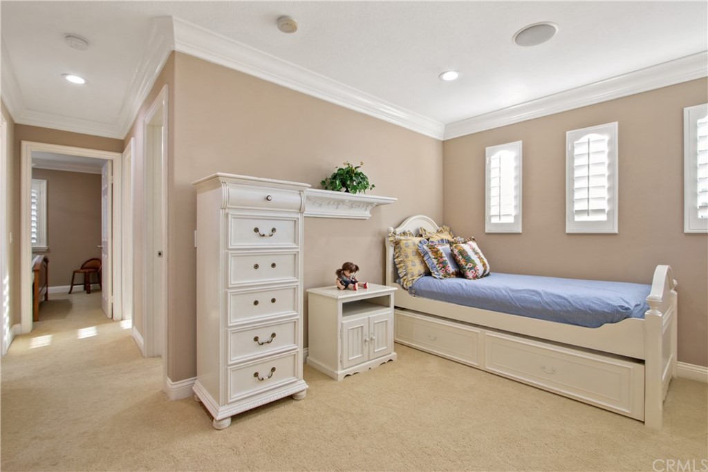 11610 Goetting Avenue Tustin, CA 92782 - Photo 29 of 62 a bedroom with furniture and a window