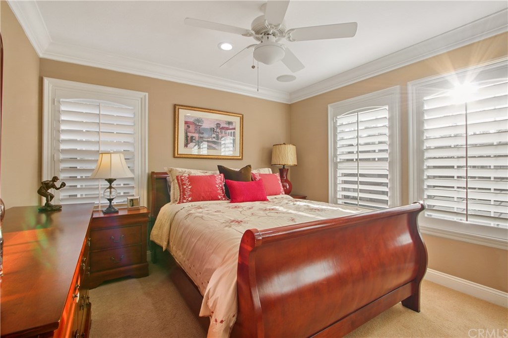 11610 Goetting Avenue Tustin, CA 92782 - Photo 33 of 62 a bedroom with bed and a large window