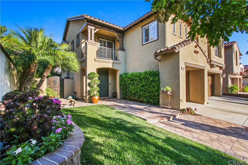 11610 Goetting Avenue Tustin, CA 92782 - Photo 5 of 62 front view of a house with a yard