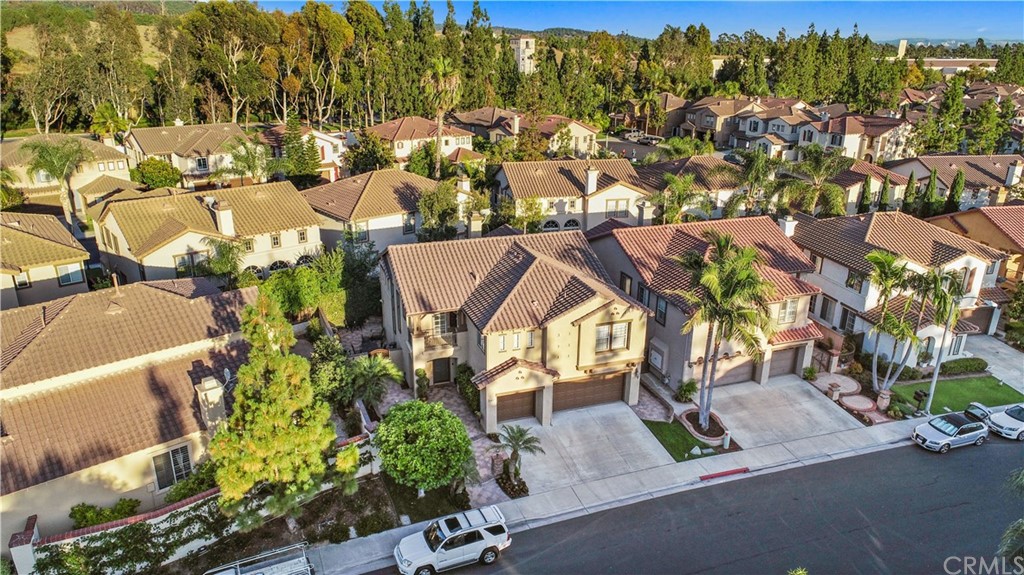 11610 Goetting Avenue Tustin, CA 92782 - Photo 51 of 62 an aerial view of residential houses with outdoor space and street view