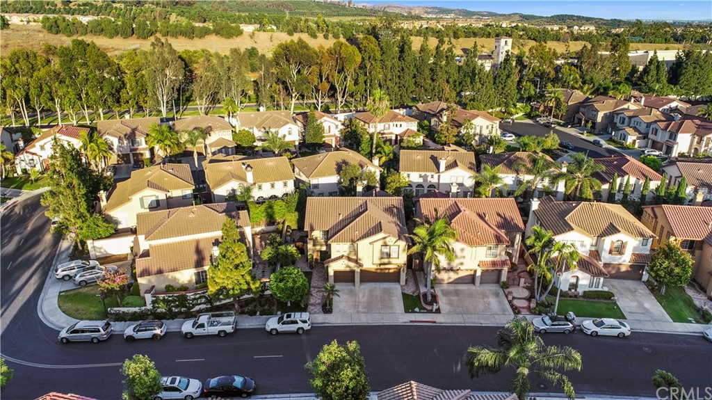 11610 Goetting Avenue Tustin, CA 92782 - Photo 53 of 62 an aerial view of residential houses with outdoor space