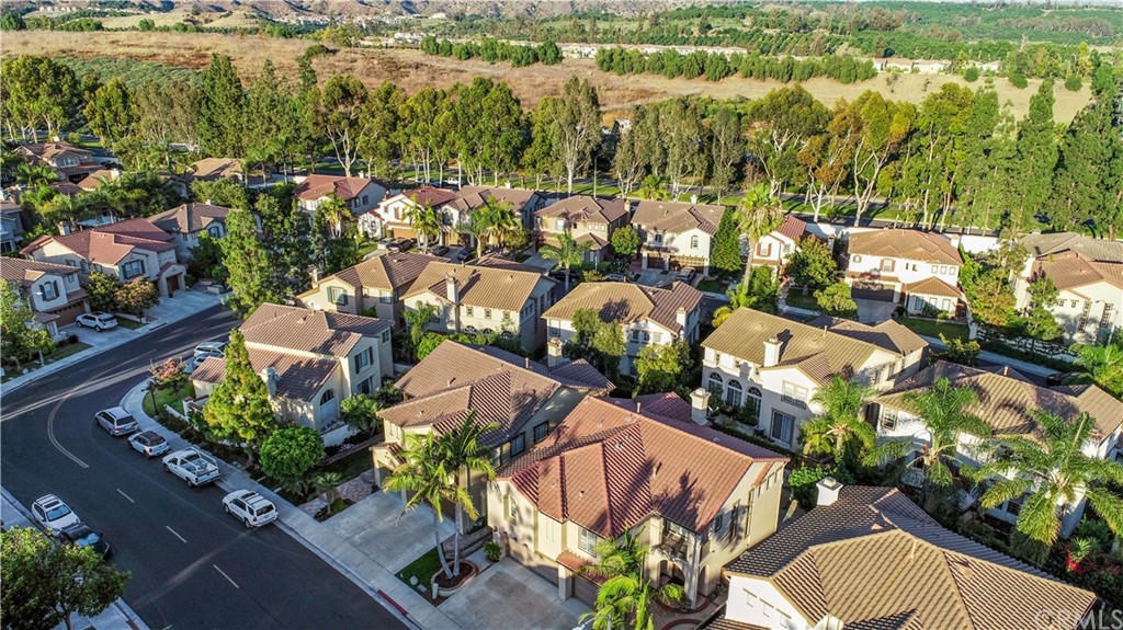 11610 Goetting Avenue Tustin, CA 92782 - Photo 54 of 62 an aerial view of residential houses with outdoor space and swimming pool