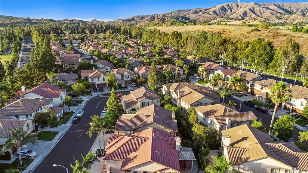 11610 Goetting Avenue Tustin, CA 92782 - Photo 55 of 62 an aerial view of residential houses with outdoor space