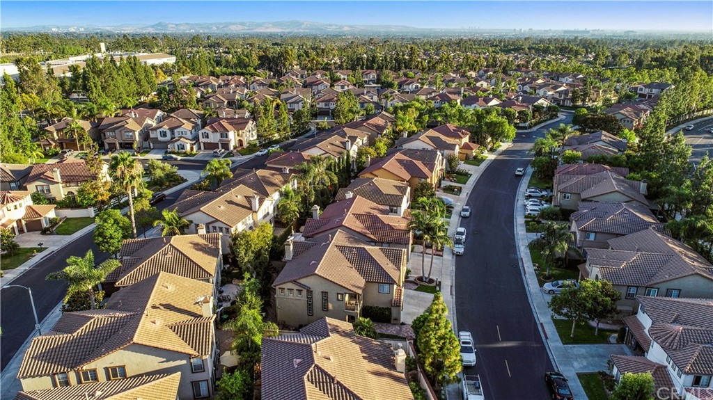 11610 Goetting Avenue Tustin, CA 92782 - Photo 59 of 62 an aerial view of residential houses with outdoor space