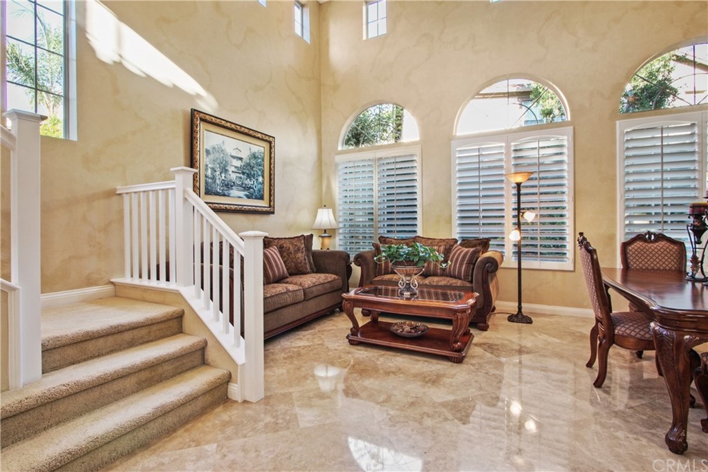 11610 Goetting Avenue Tustin, CA 92782 - Photo 9 of 62 a living room with furniture and windows