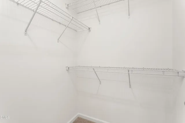 an empty room with an entryway