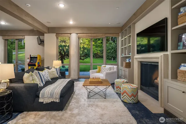 a spacious bedroom with a bed and a large window