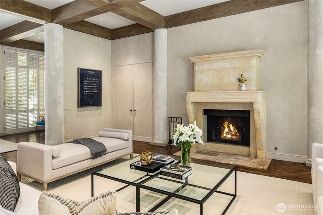 a bedroom with a large bed and a large window