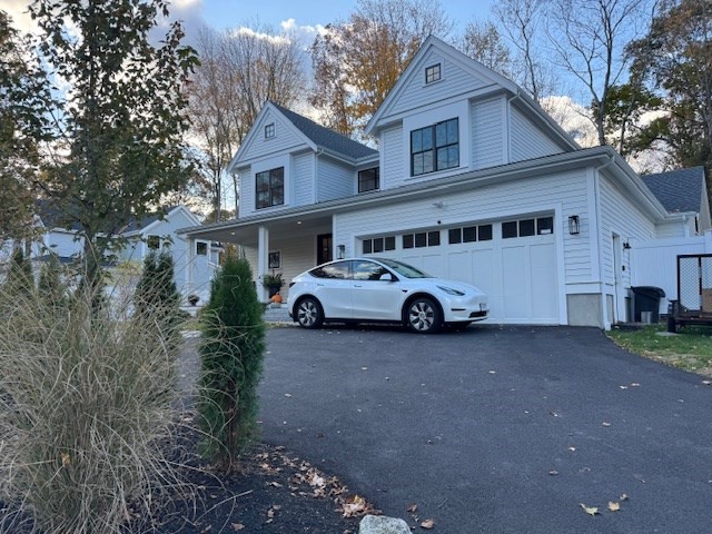 a car parked in front of a house
