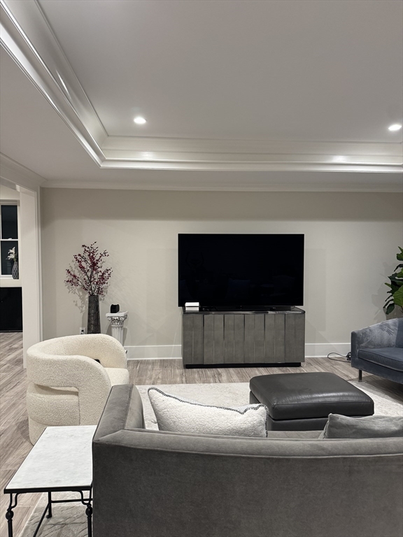 91 Seaver Street Wellesley, MA 02481 - Photo 15 of 18 a living room with furniture and a flat screen tv