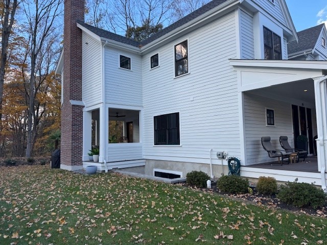 91 Seaver Street Wellesley, MA 02481 - Photo 18 of 18 a front view of a house with a yard