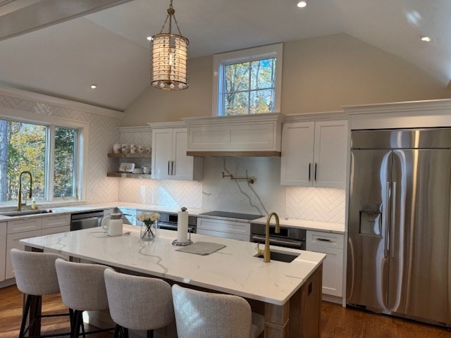 91 Seaver Street Wellesley, MA 02481 - Photo 5 of 18 a kitchen with appliances cabinets and furniture
