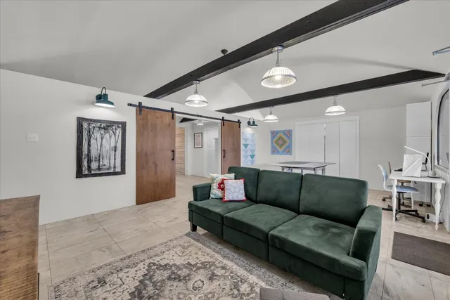 a kitchen with a table and chairs in it