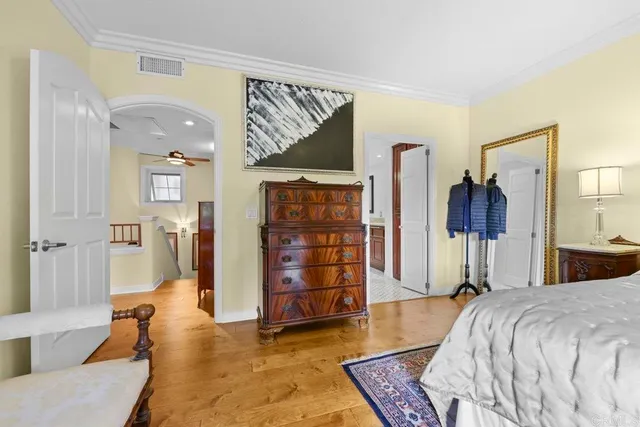 a bathroom with double vanity sink and a mirror