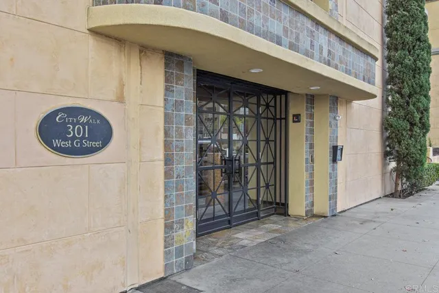 a view of a door and wooden wall