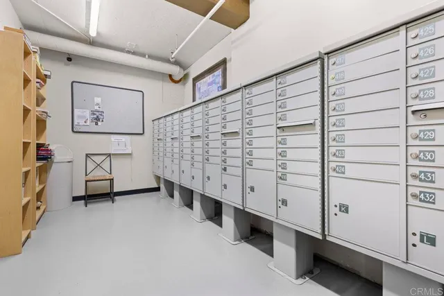 a view of parking garage with cars