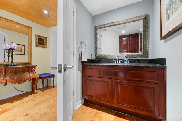 a bathroom with a sink and a mirror