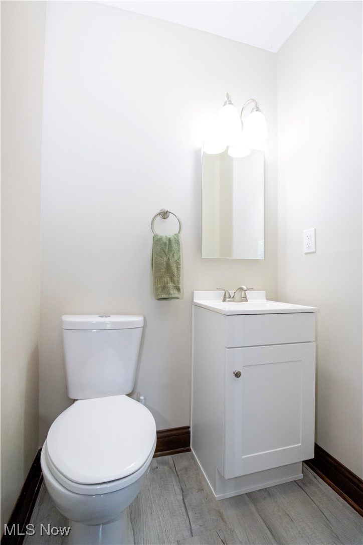 8154 Haas Road Wooster, OH 44691 - Photo 31 of 34 Bathroom featuring vanity and toilet