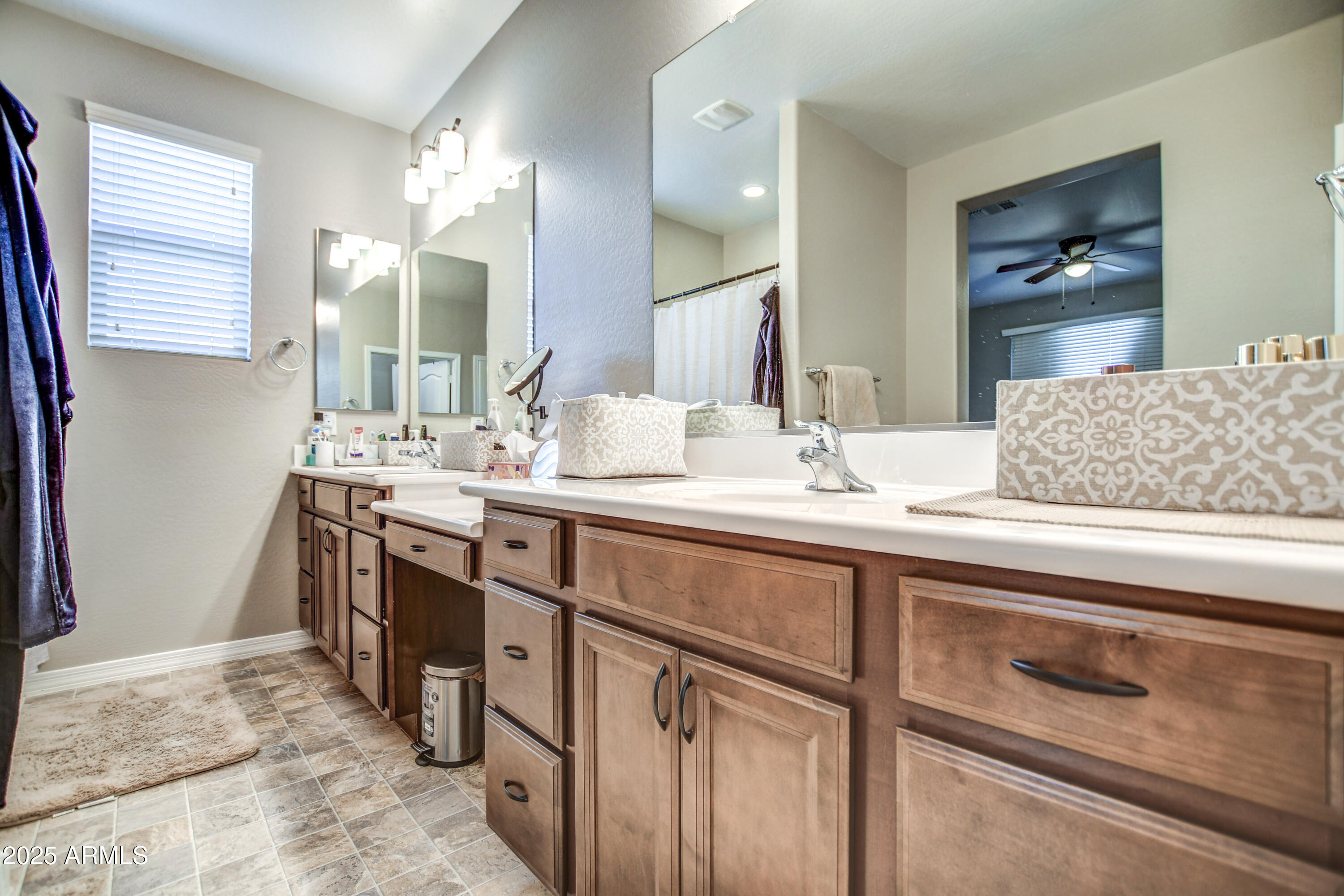 2842 East Fraktur Road Phoenix, AZ 85040 - Photo 23 of 46 a bathroom with a sink and a mirror