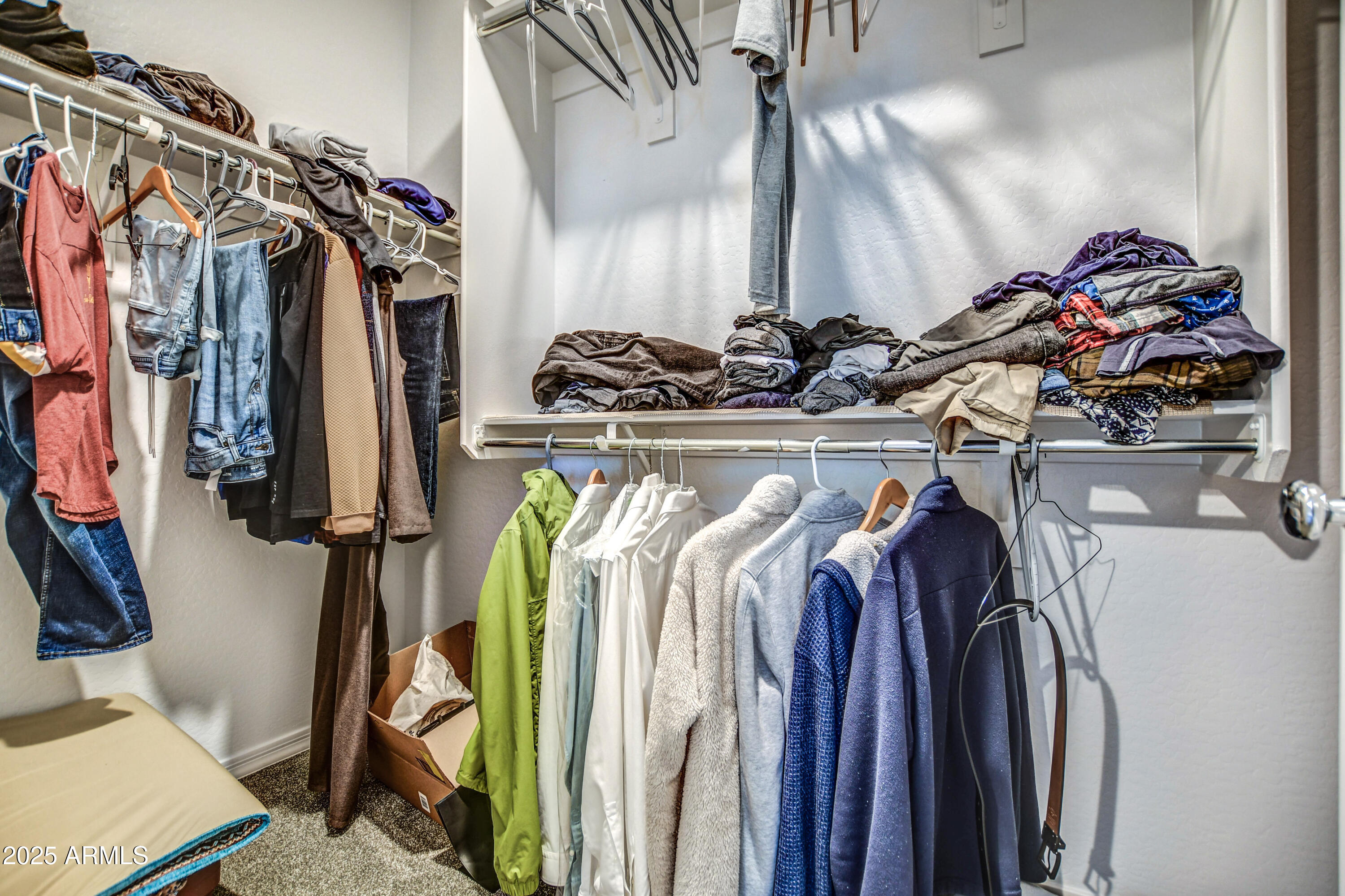 2842 East Fraktur Road Phoenix, AZ 85040 - Photo 28 of 46 a view of walk in closet with clothes and shoes