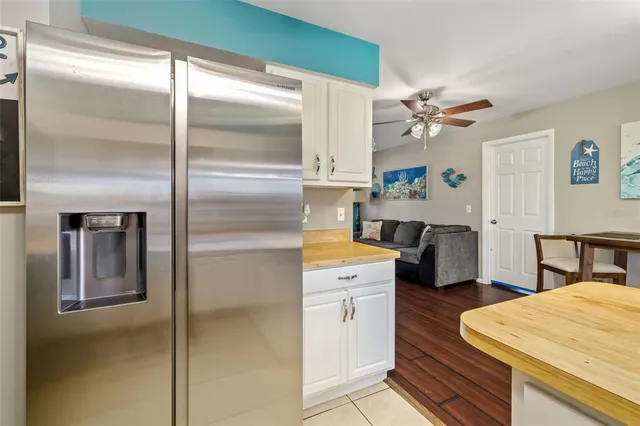 a kitchen with a refrigerator a sink and dishwasher