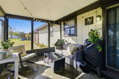 a outdoor living space with furniture and garden view