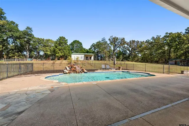 a view of a road with a yard