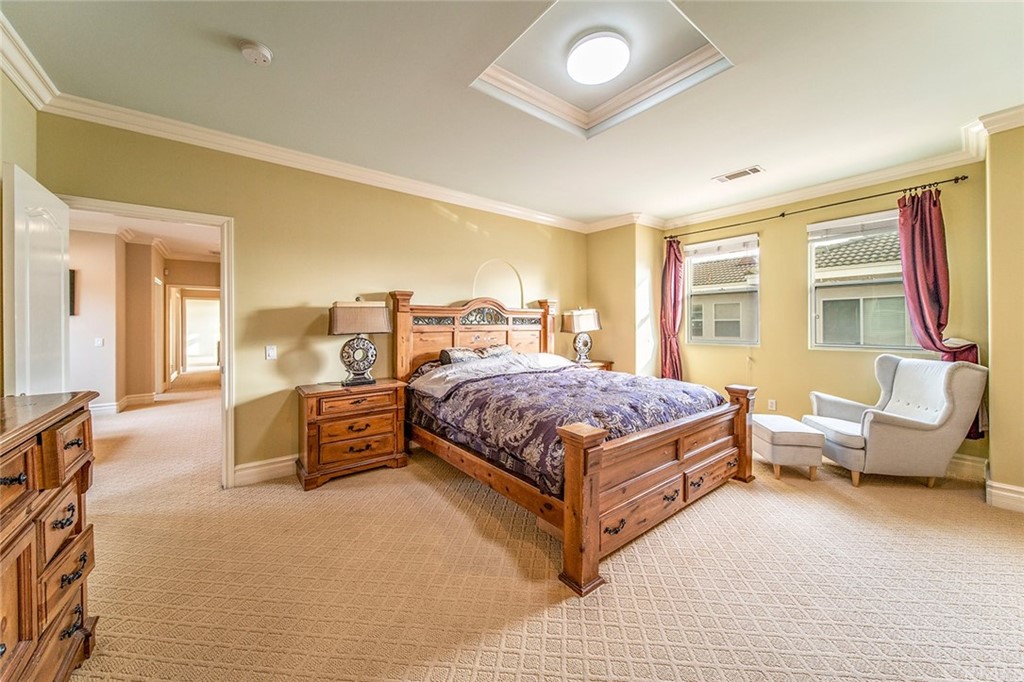 5237 Temple City Boulevard Temple City, CA 91780 - Photo 14 of 23 a bedroom with a large bed and wooden floor