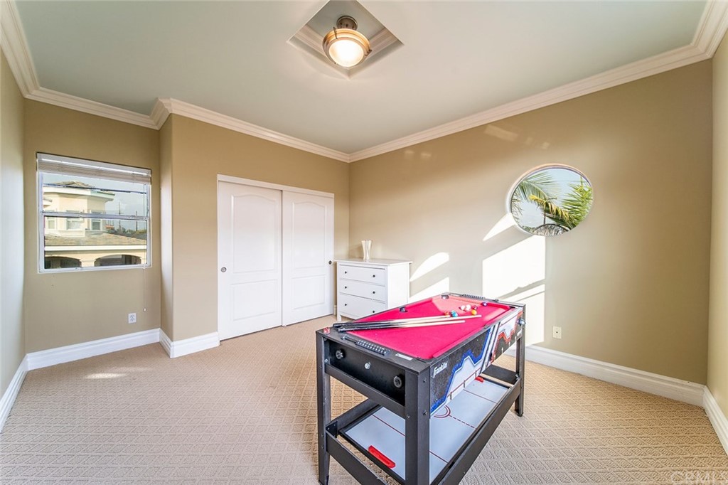 5237 Temple City Boulevard Temple City, CA 91780 - Photo 21 of 23 a room with a bed and a chandelier